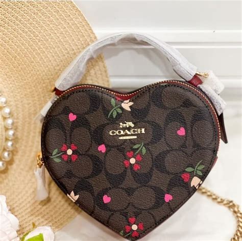 coach heart crossbody in signature canvas with heart petal print